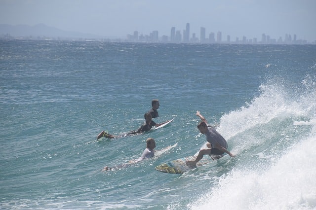 Gold Coast skyline and surfing beach: plenty of sunshine for solar power Gold Coast skyline and surfing beach: plenty of sunshine for solar power
