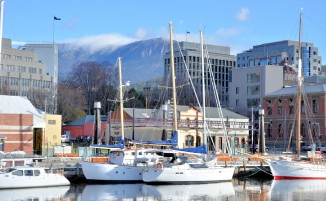Hobart nestles under the often snow-peaked Mt Wellington.