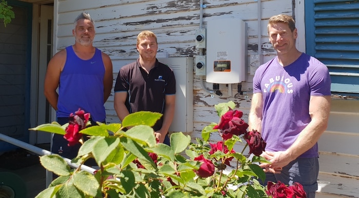 Solar panel rebate: Mike Wright and Buddy Norris, MASH installers and Carl Harvey, MASH customer in Castlemaine, Victoria