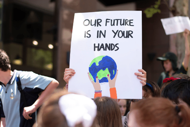 Our Future is in your hands sign: NSW Greens announce mandatory solar ahead of next month's election.