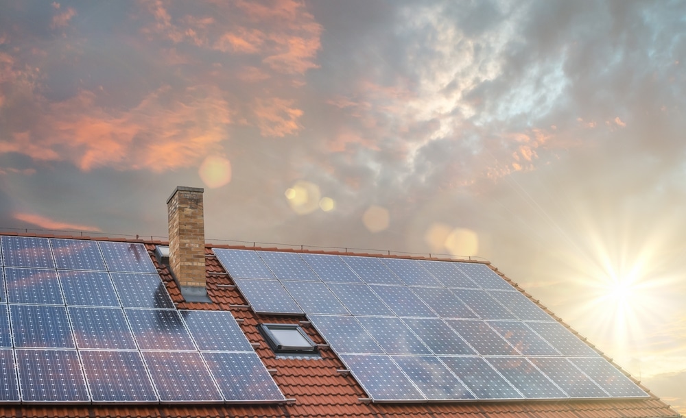 Photovoltaic,Or,Solar,Panels,On,Roof,At,Sunset.