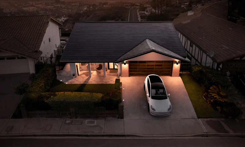 tesla solar roof at night