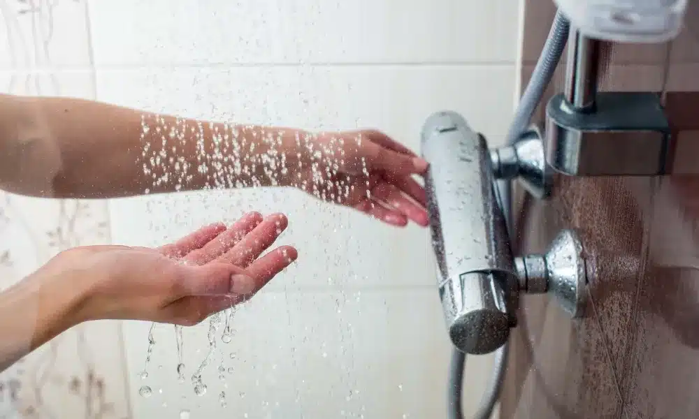 Hot shower with a heat pump hot water system