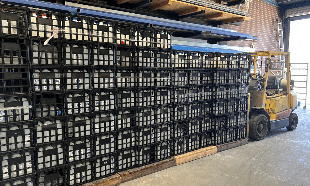 Milk bottles ready to be recycled by Popit
