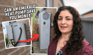 Woman presenter beside a tall outdoor heat pump, with a red arrow pointing to it to suggest potential energy savings.