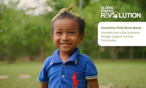 Smiling Cambodian boy in blue polo outdoors, campaign branding for Sunshine That Gives Back. Smiling Cambodian boy in blue polo outdoors, campaign branding for Sunshine That Gives Back.