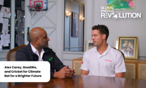 Two men sit at a wooden table in a meeting room, conversing, with a Global Energy Revolution logo in the top-right corner. Two men sit at a wooden table in a meeting room, conversing, with a Global Energy Revolution logo in the top-right corner.