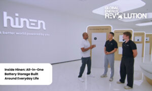 Three men in a bright showroom discuss all-in-one battery storage, with Hinen branding on the wall and a Global Energy Revolution logo visible. Three men in a bright showroom discuss all-in-one battery storage, with Hinen branding on the wall and a Global Energy Revolution logo visible.