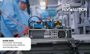 Industrial inverter hardware on a conveyor with blue-clad workers blurred in the background; GLOBAL ENERGY REVOLUTION logo visible top right. A white speech bubble reads: Inside Solis: The Inverter Technology Connecting Solar, Batteries, and Everyday Life. Industrial inverter hardware on a conveyor with blue-clad workers blurred in the background; GLOBAL ENERGY REVOLUTION logo visible top right. A white speech bubble reads: Inside Solis: The Inverter Technology Connecting Solar, Batteries, and Everyday Life.